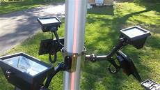 Flagpole with lamps
